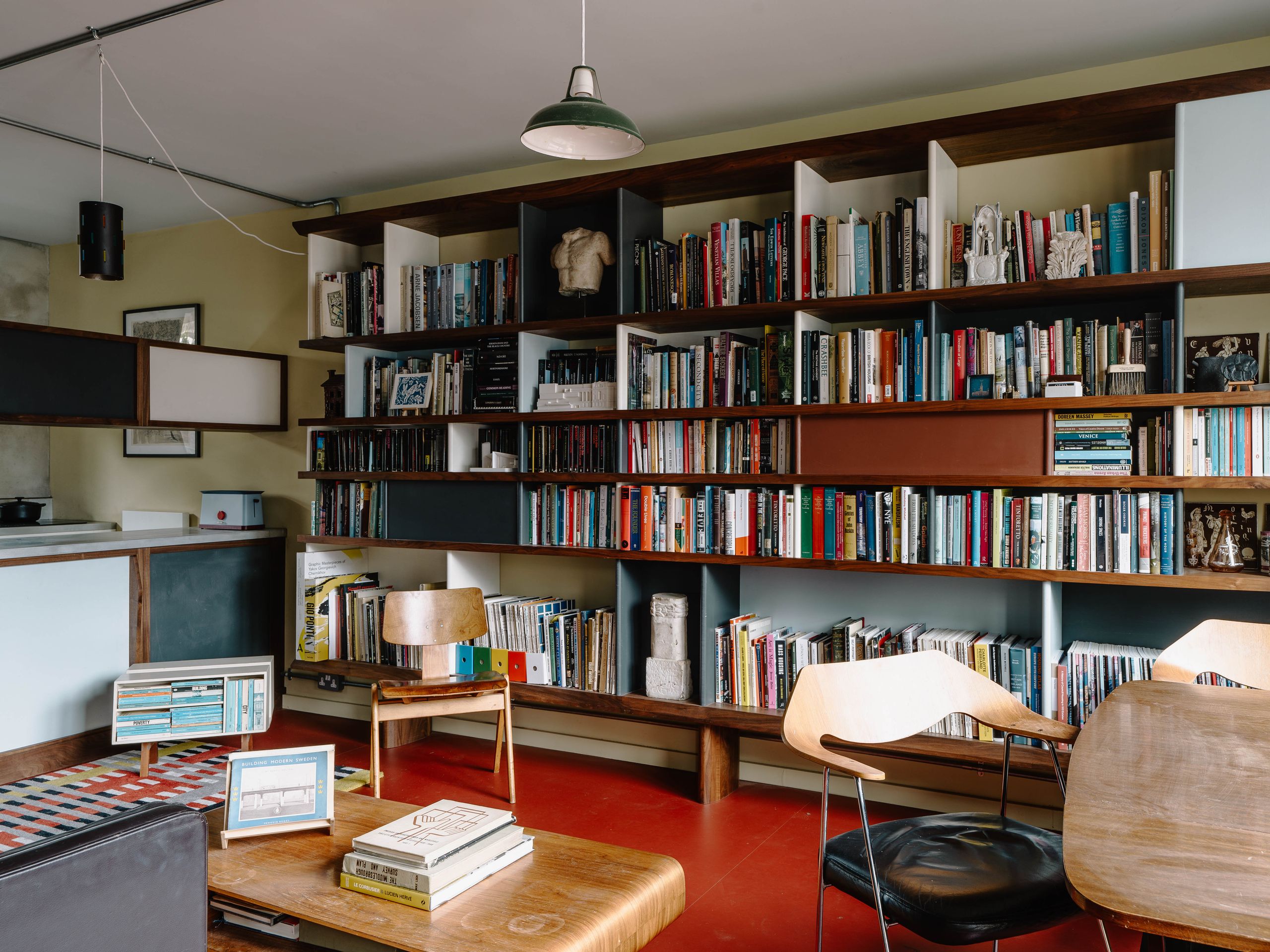 Otto SaumerezSmith Image may contain Furniture Chair Bookcase Lamp Book Publication Cup Person Desk Table Art and Painting